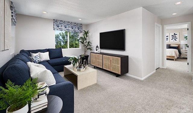 living room featuring light colored carpet