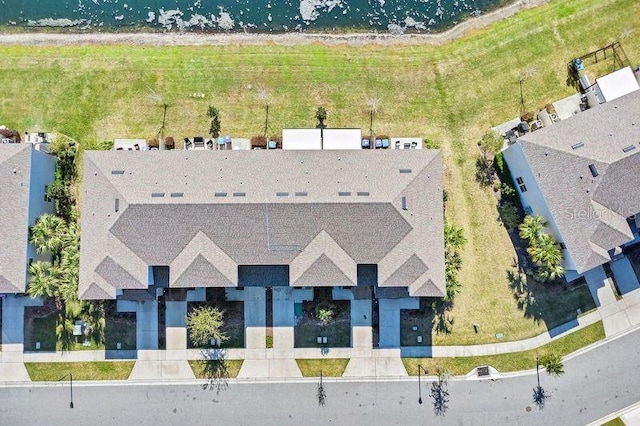 bird's eye view featuring a view of the beach and a water view