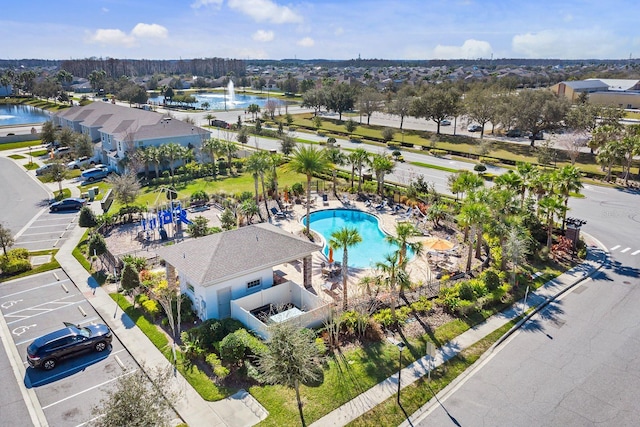 birds eye view of property featuring a water view