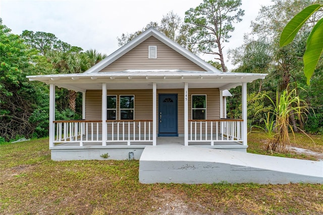 bungalow-style home with a porch