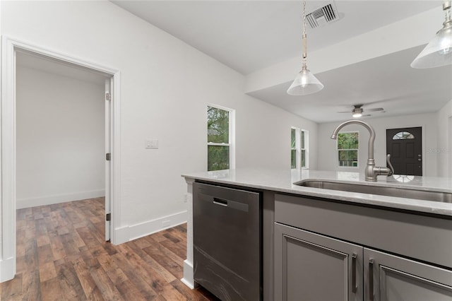 kitchen featuring decorative light fixtures, dishwasher, sink, ceiling fan, and dark wood-type flooring