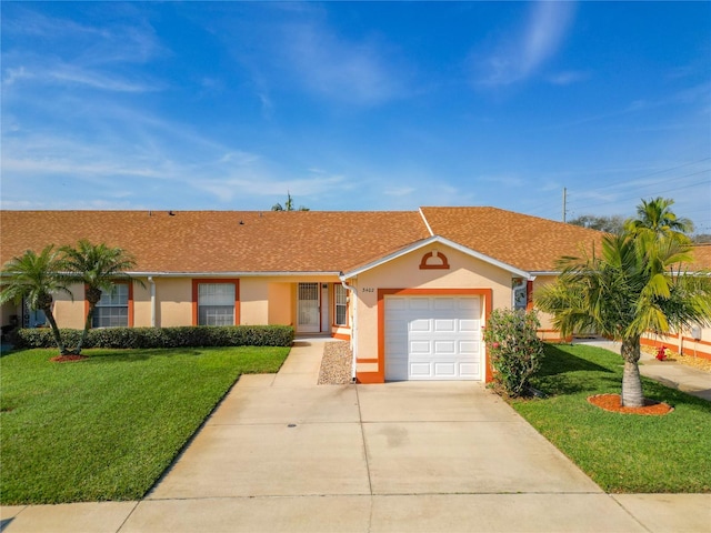 single story home with a garage and a front yard