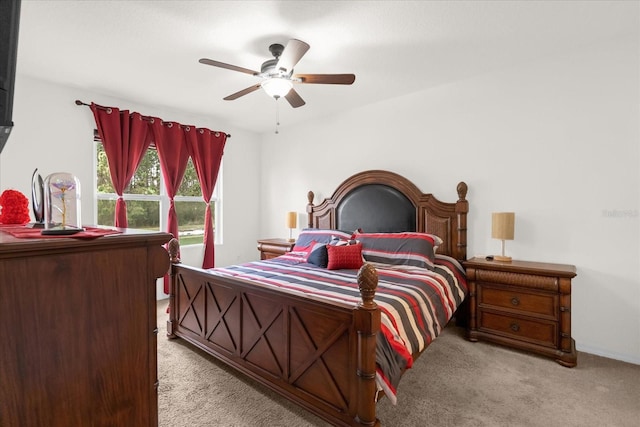 bedroom with light carpet and ceiling fan