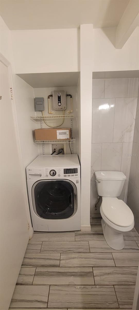 laundry area featuring washer / clothes dryer