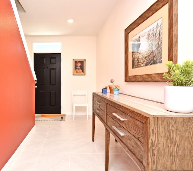 foyer with light tile patterned flooring