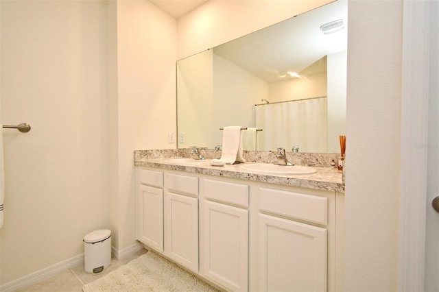 bathroom featuring vanity, tile patterned floors, and a shower with shower curtain