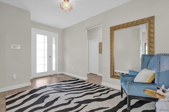 living area with hardwood / wood-style flooring