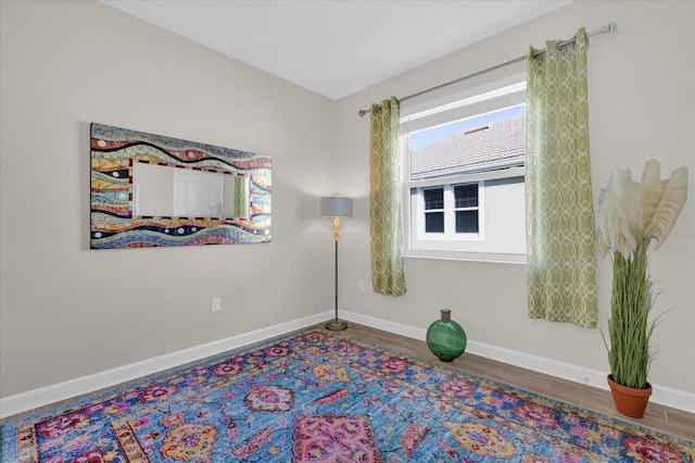 unfurnished room featuring dark hardwood / wood-style floors