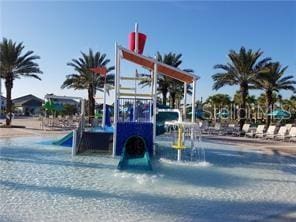 view of play area featuring a beach view