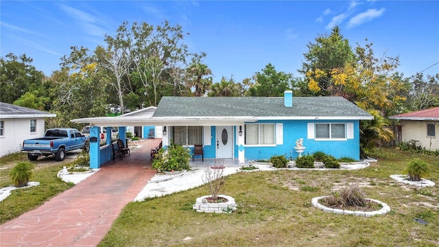 single story home with a front lawn and a porch