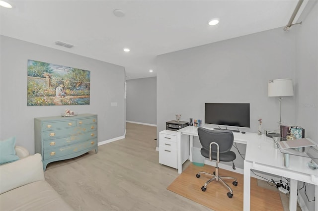 office area with light wood-type flooring