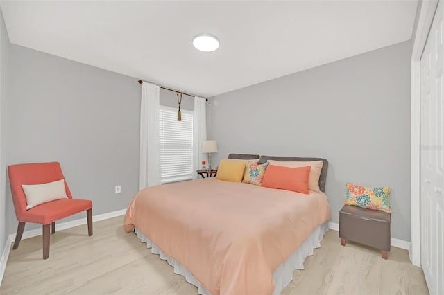 bedroom with light wood-type flooring