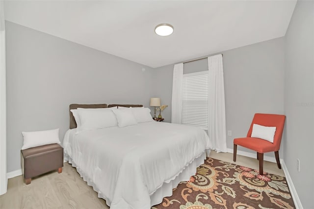 bedroom featuring light wood-type flooring