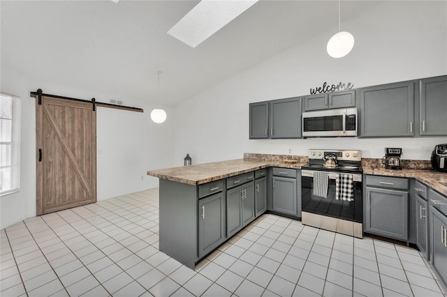 kitchen featuring gray cabinets, appliances with stainless steel finishes, light tile patterned flooring, decorative light fixtures, and kitchen peninsula