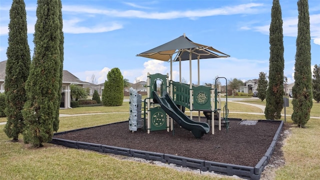 view of play area featuring a lawn