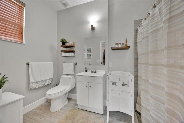 bathroom with vanity, a shower with curtain, wood-type flooring, and toilet