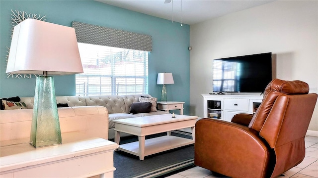 living room with light tile patterned flooring