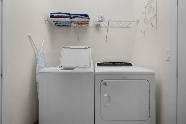 laundry room with laundry area and separate washer and dryer