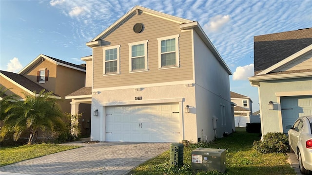 view of front of house with a garage