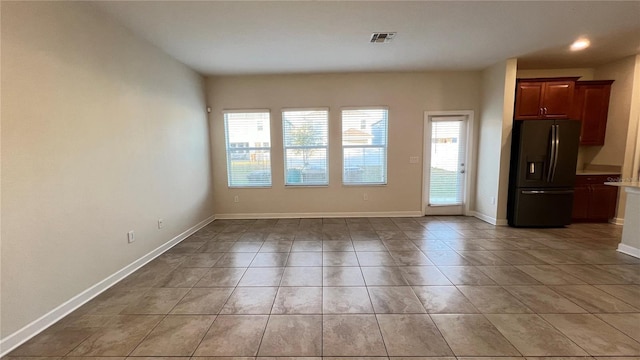 interior space with light tile patterned floors