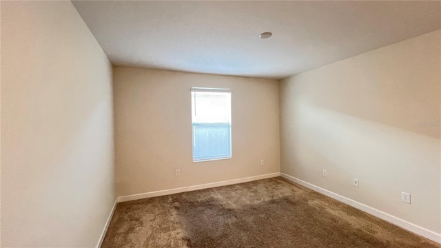 empty room featuring carpet