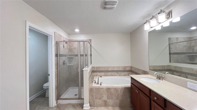 full bathroom with vanity, shower with separate bathtub, tile patterned flooring, and a textured ceiling