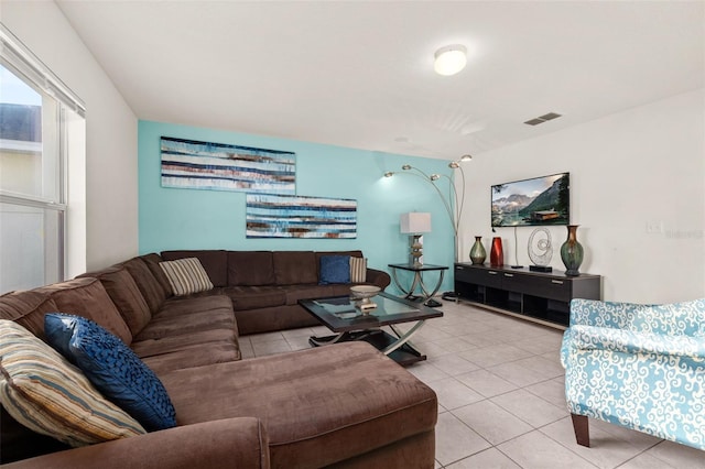 living room with light tile patterned flooring