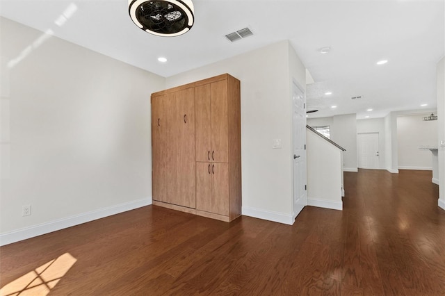 foyer with dark hardwood / wood-style flooring