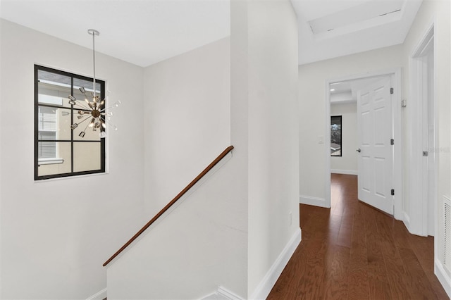 hallway featuring dark hardwood / wood-style floors