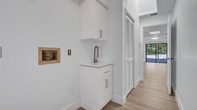 hallway featuring light hardwood / wood-style floors