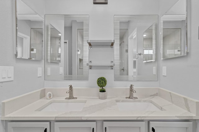 bathroom with vanity and walk in shower