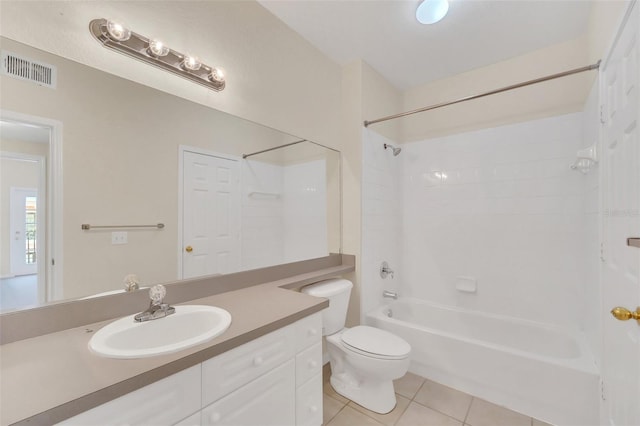 full bathroom with toilet, vanity, tile patterned floors, and shower / bathing tub combination