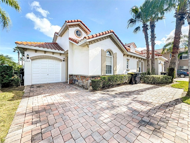 view of front of property with a garage