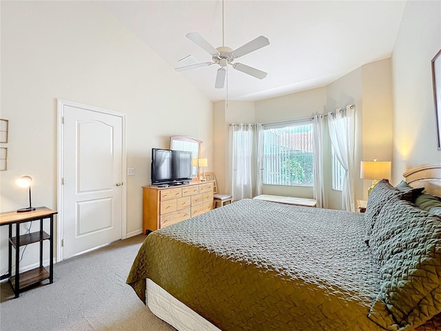 bedroom with lofted ceiling, light carpet, and ceiling fan