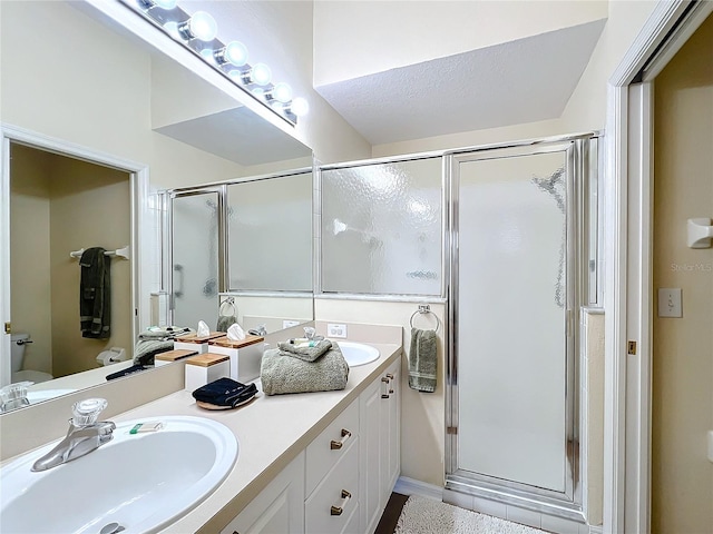 bathroom with vanity and walk in shower