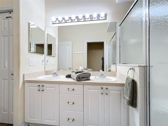 bathroom with vanity and walk in shower