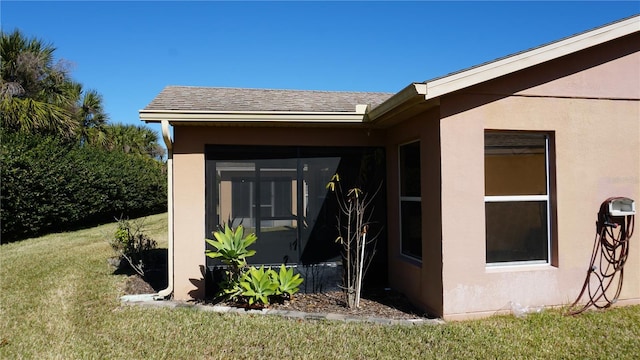 exterior space with a lawn