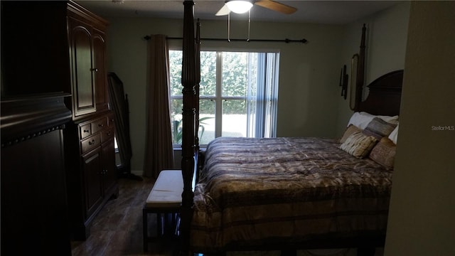 bedroom featuring dark wood-type flooring and ceiling fan