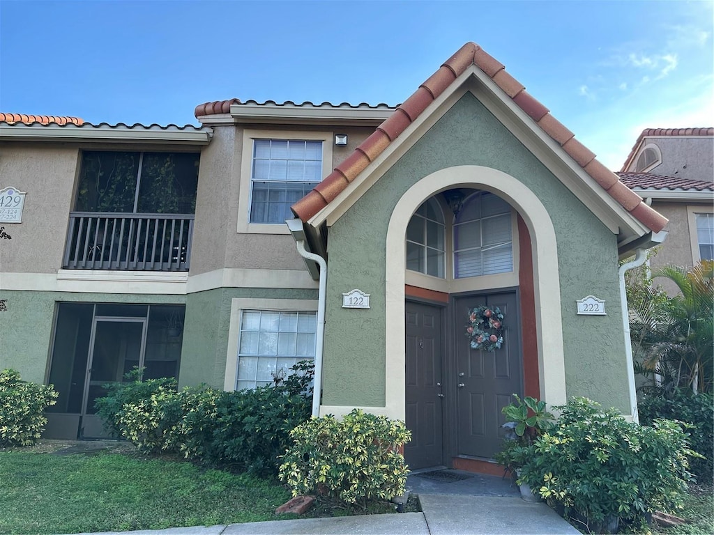 doorway to property with a balcony