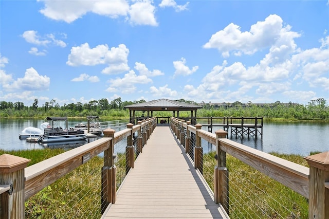 dock area with a water view and a gazebo