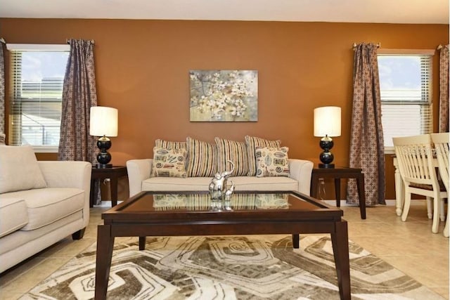 living room with tile patterned floors