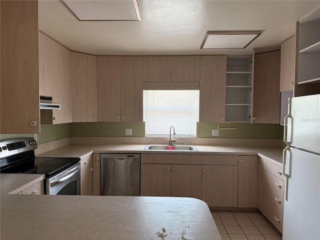 kitchen with light tile patterned flooring, sink, ventilation hood, light brown cabinets, and stainless steel appliances