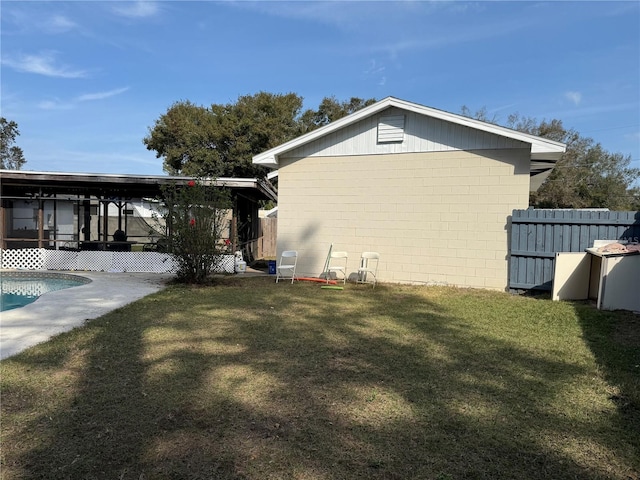 view of home's exterior featuring a yard