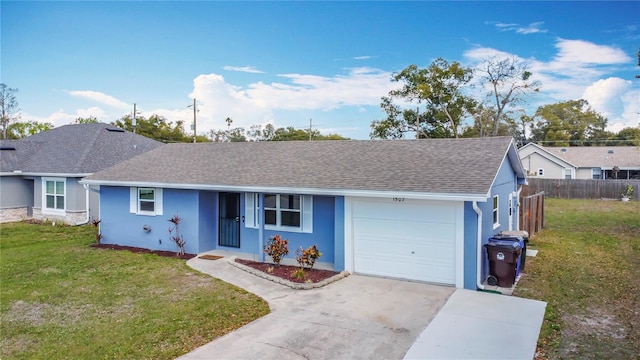 single story home with concrete driveway, roof with shingles, an attached garage, a front lawn, and stucco siding