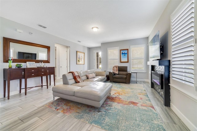 living room with light hardwood / wood-style floors