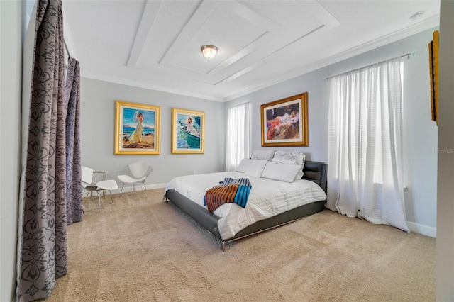 bedroom with ornamental molding and carpet