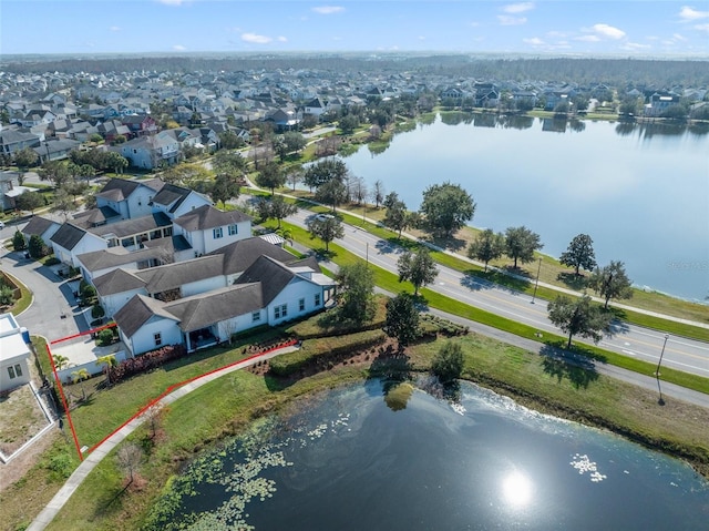 drone / aerial view with a water view