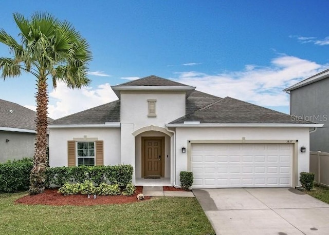 3857 San Isidro Cir, Saint Cloud, FL 34772 - view of front of home with a garage