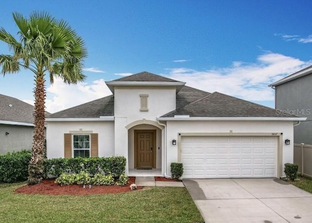 view of front of home with a garage