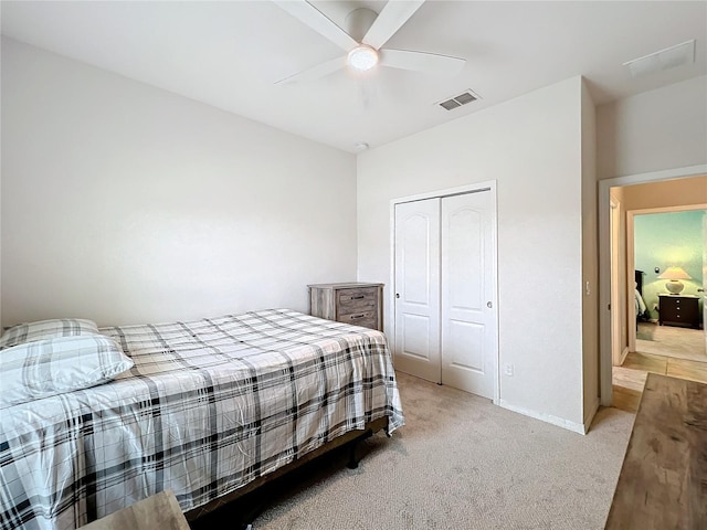 3857 San Isidro Cir, Saint Cloud, FL 34772 - carpeted bedroom with ceiling fan and a closet